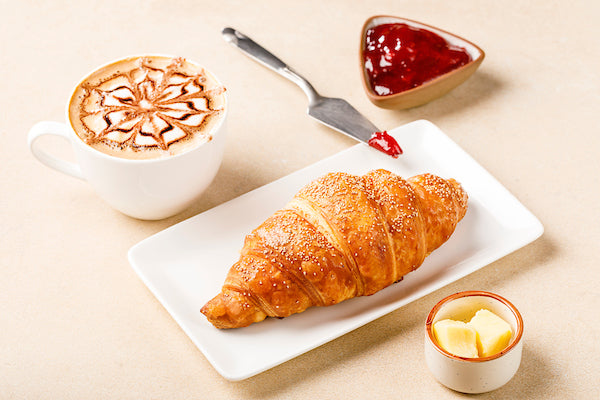 Butter croissant and cappucino